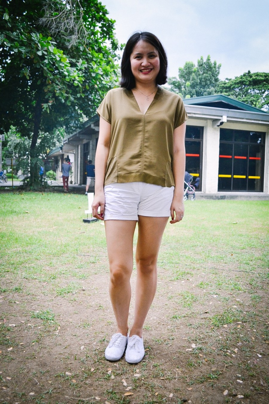 You can't go wrong with neutrals! Kat Dalusong paired her Zara blouse with Mango shores and thrifted sneakers.