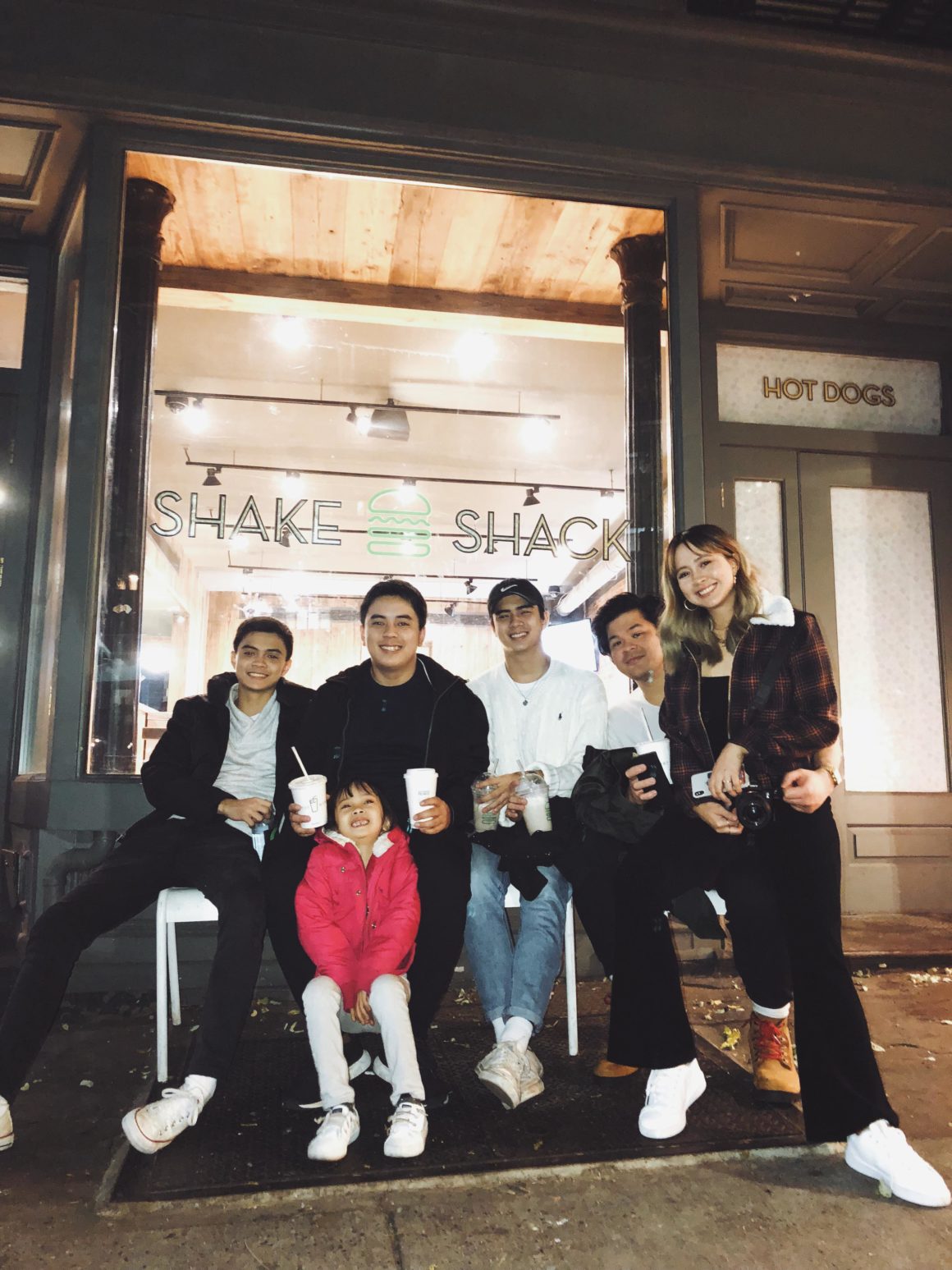 Camie Juan with her family having some burgers from Shake Shack