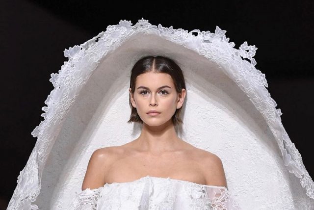 Kaia Gerber’s Givenchy gown has a rain-friendly veil