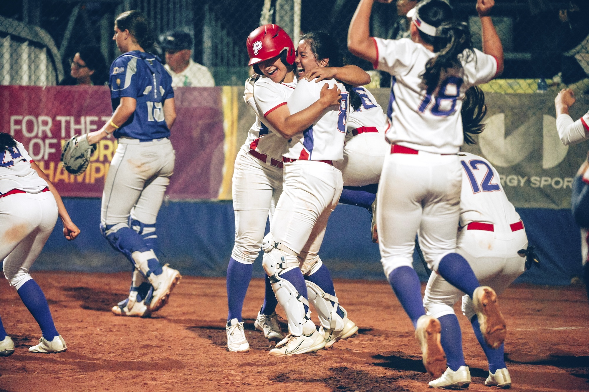 Francesca Altomonte celebrating with the team during their match against Italy at the XVII Women Softball World Cup Group C 