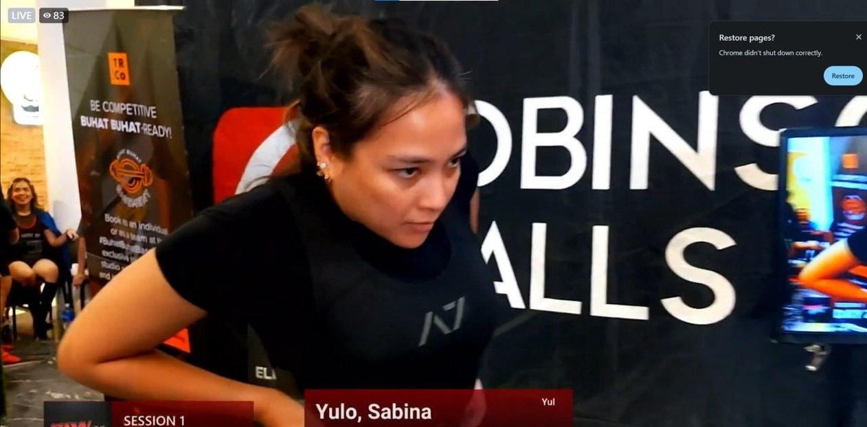 Screenshot of Sabina Yulo during a competition